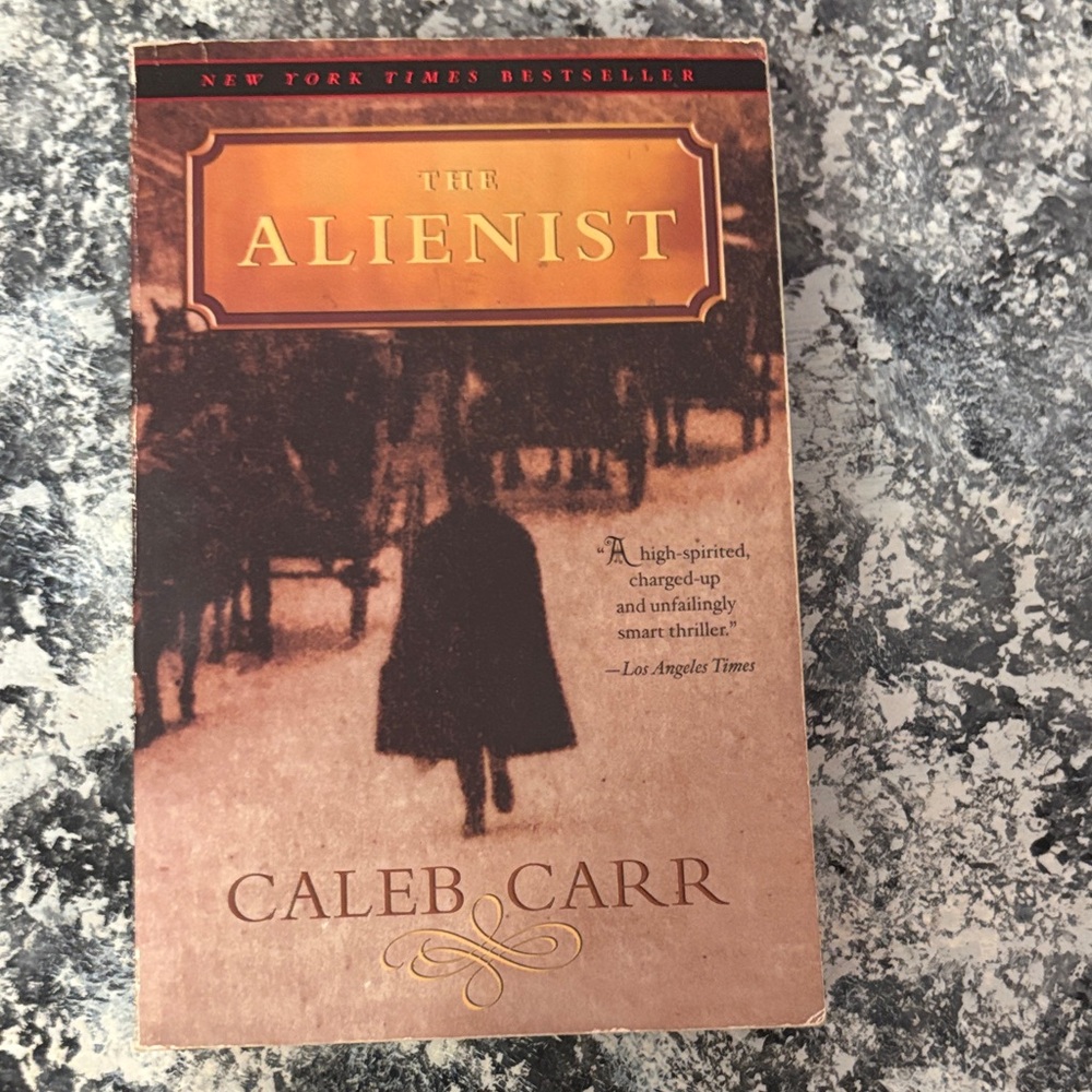 The Alienist by Caleb Carr - Beige & Brown Vintage Thriller Paperback